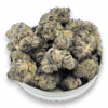 Close-up of Oreo cannabis buds showing dense, frosty trichomes with rich green and purple hues – a hybrid strain with 25–28% THC.