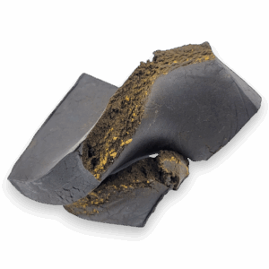 Moroccan Black Hash – traditional dark hashish with soft, pliable texture and earthy-spicy aroma