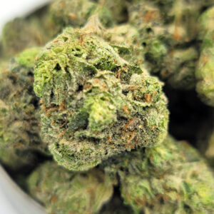 Macro shot of Purple Monkey Balls minis highlighting crystal-covered purple buds