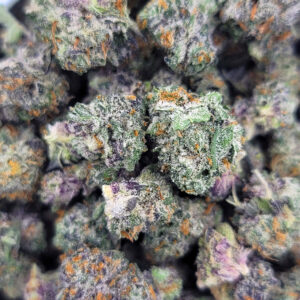 Dense Darth Vader OG buds with dark purple hues and frosty trichomes