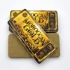 Moroccan Gold premium hash slabs in gold-bar packaging with palm tree design
